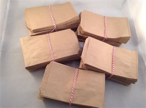 small flat brown paper bags.